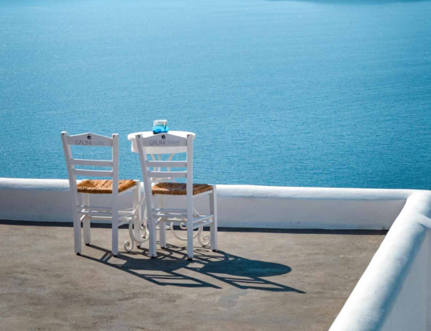 A breathtaking panoramic view from Nydri, showcasing rolling green hills and the deep blue Ionian Sea.