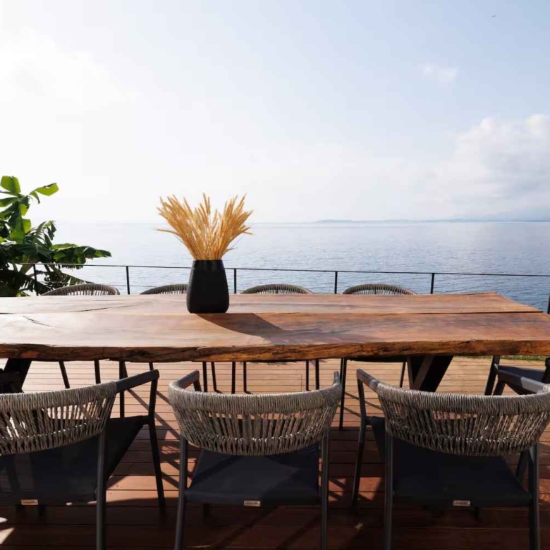 Luxury 260 sq.m. beachfront villa for sale in Corfu with private pool, garden, direct beach access, and panoramic sea views.